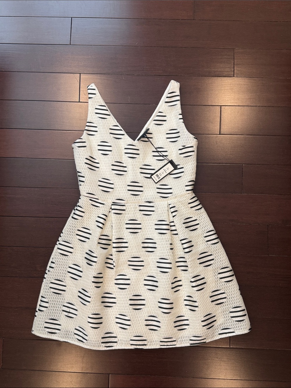 Romeo & Juliet Couture White Mini Dress with Black Striped Circle Print
